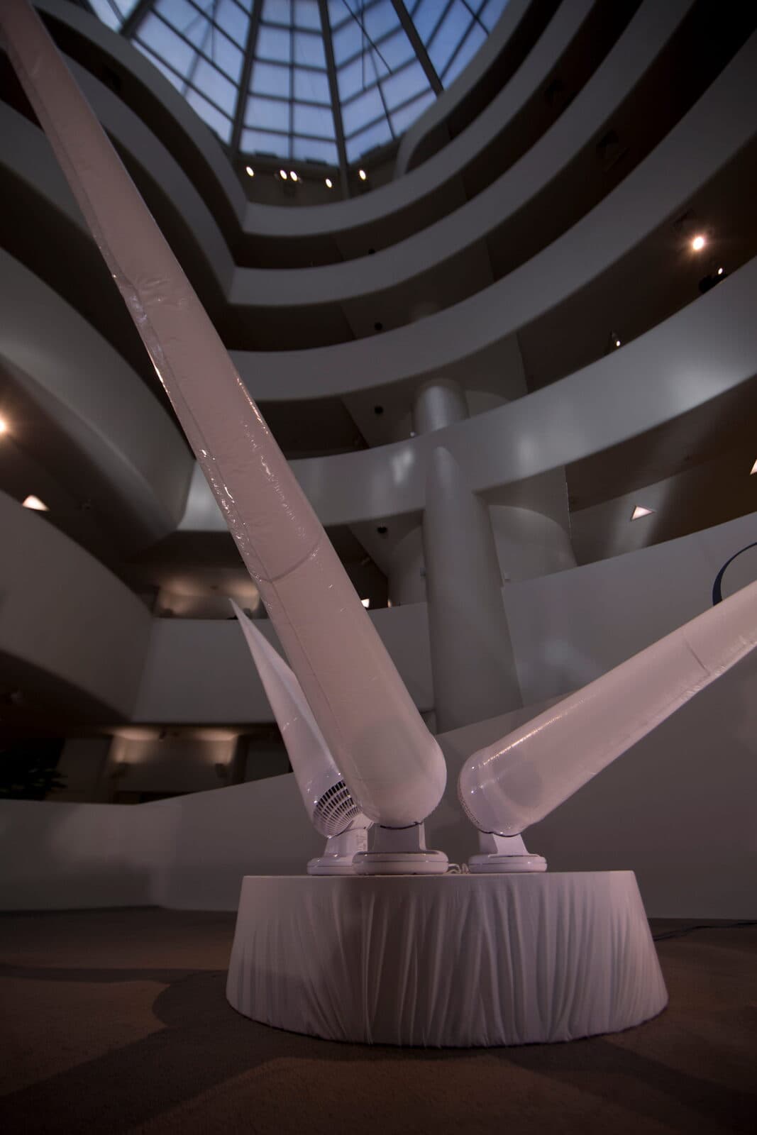 Inflatable sculptures viewed from below the museum's spiral
