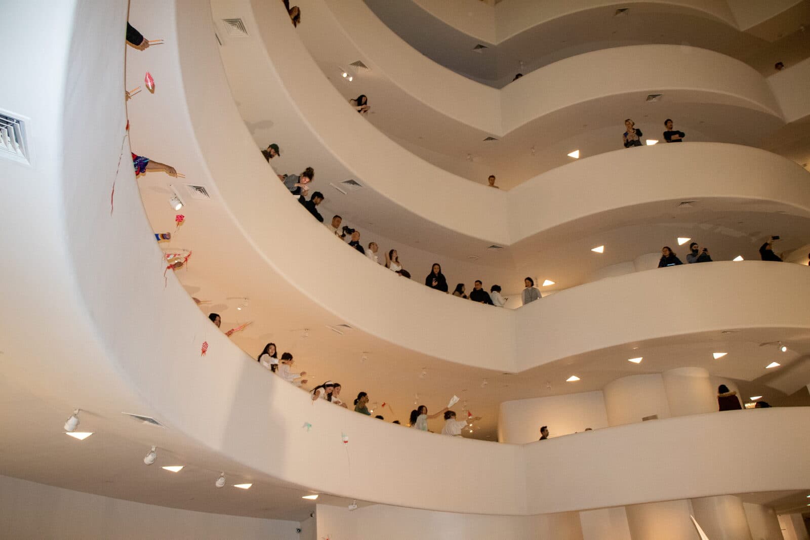 Attendees at the museum railing during the kite procession